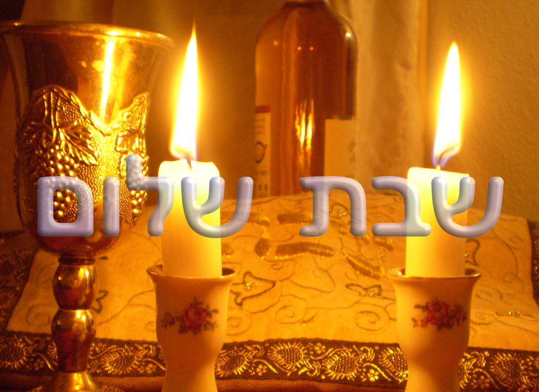 Shabbat message against two candles.